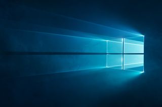 WIP versions of Windows 10 desktop background with light being filtered through a physical windows 10 logo